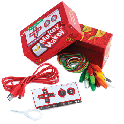 Makey Makey kit with all the pieces spilling out.