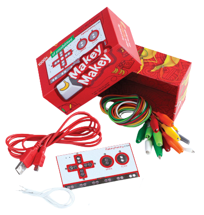 Makey Makey kit with all the pieces spilling out.