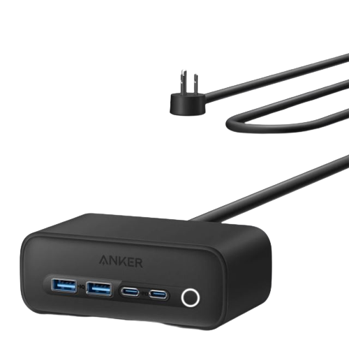Black rectangular charging station with a cord trailing behind it.