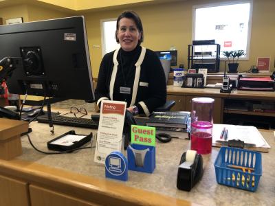 Sabrina at the Reference and Technology Desk