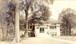 A sepia-toned image of the original Wilmette Public Library Carnegie building 