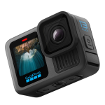 A black GoPro Hero 13 with its front display on, showing an image of a diver in an underwater cave with light streaming down from above.